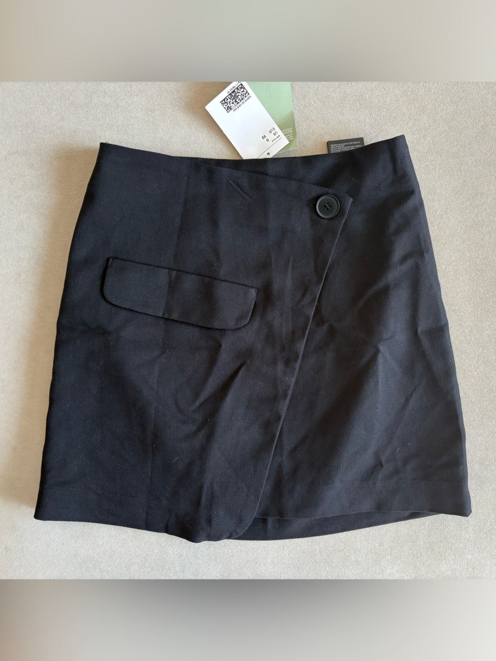H&M Black Mini Skirt with Front Button and Pocket Flap
